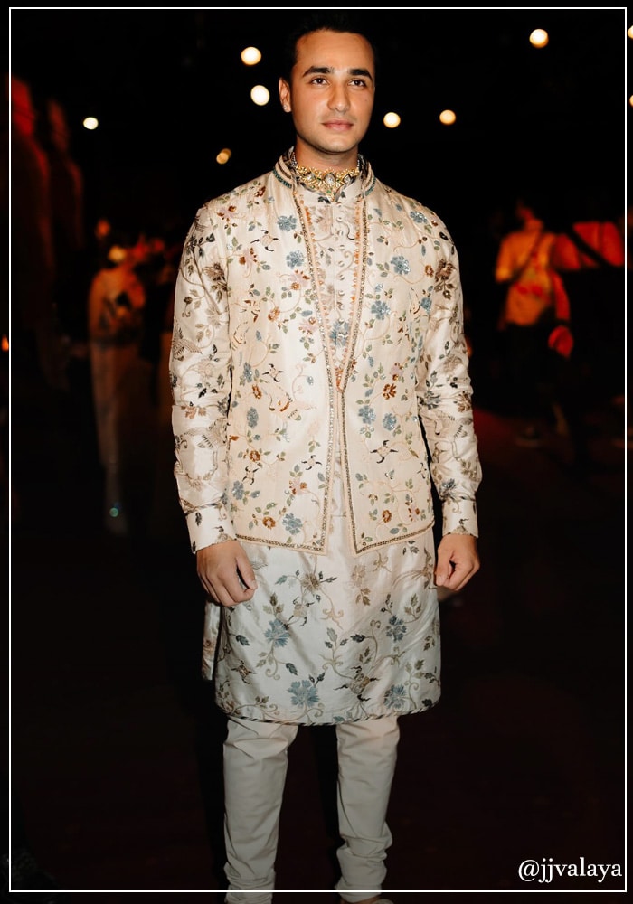 Abhishek Sharma walking the runway for JJ Valaya in floral Bandhani kurta set