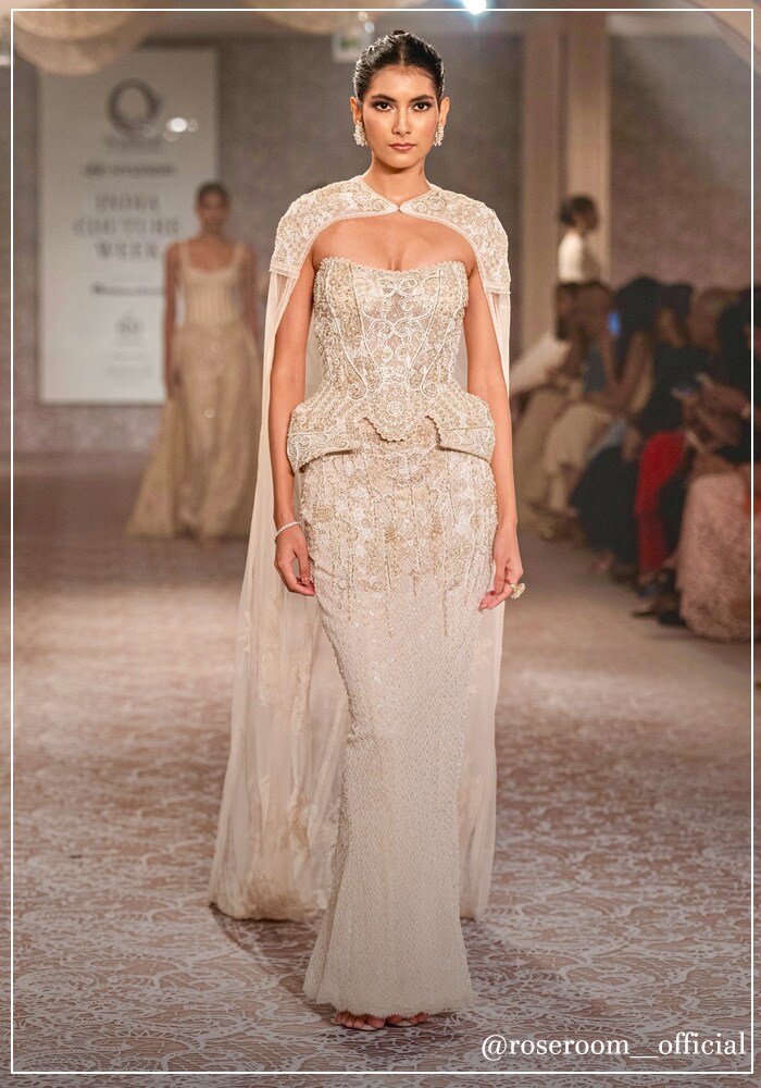 Model wearing a cape couture