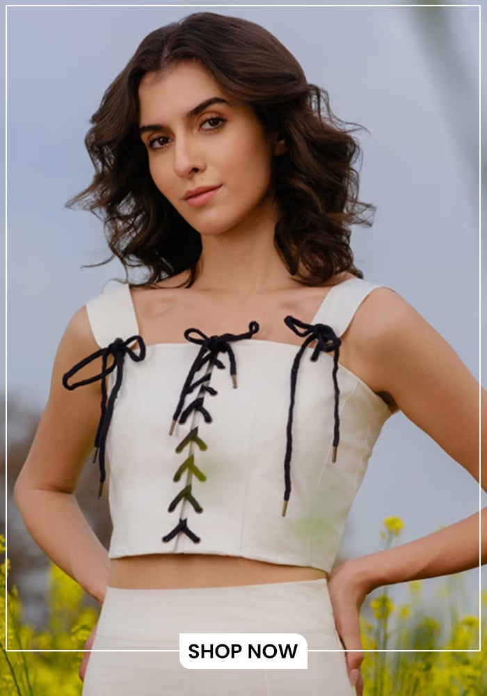 Model wearing monochrome white crop topwith square neckline