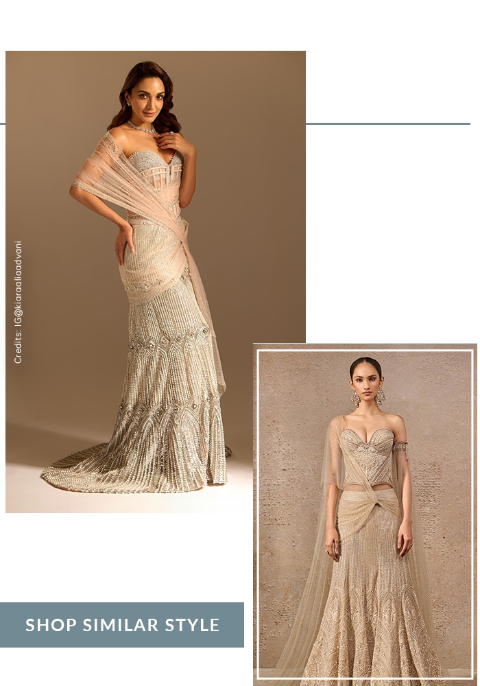 Kiara in white mermaid style lehenga and corset blouse