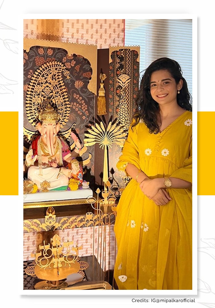 Mithila Palkar wearing a yellow anarkali set for Ganesh utsav