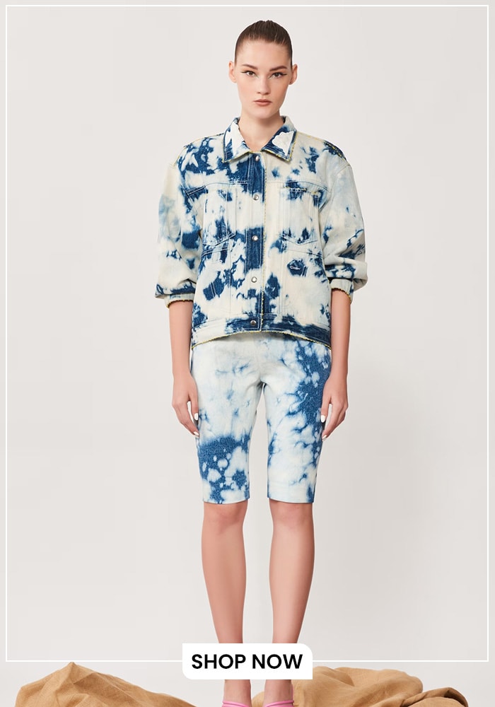 Model wearing washed denim jorts