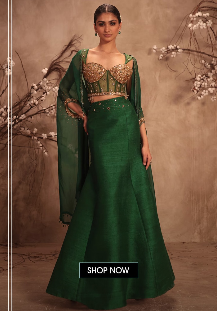 Emerald green organza lehenga with sweetheart neckline