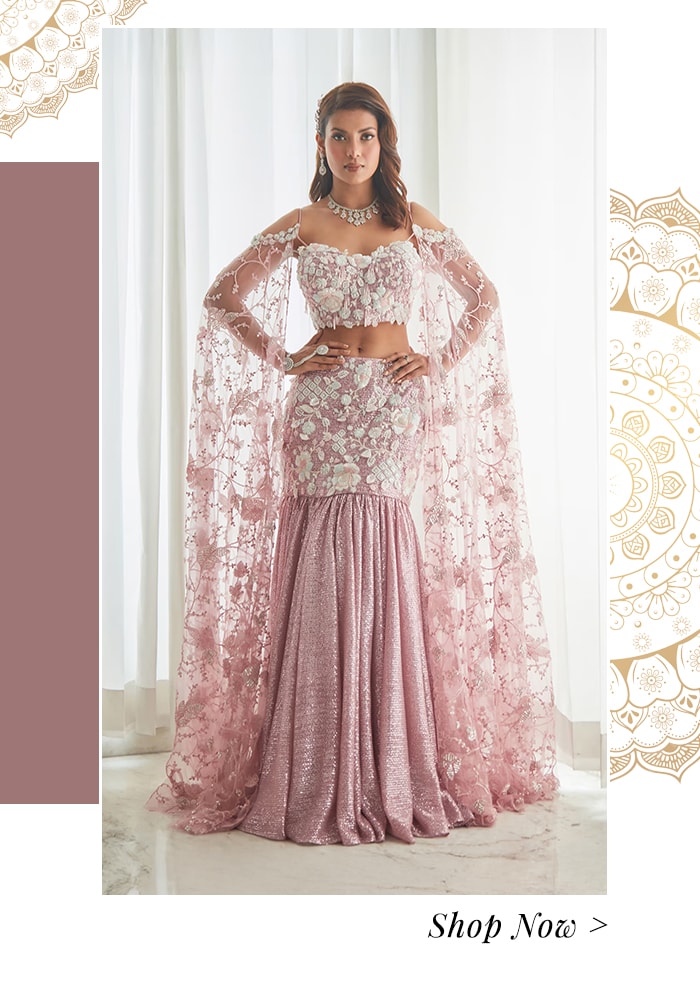 Model wearing a crystal floral embroidered fishcut lehenga