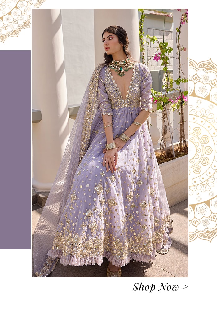 Model wearing a lavender anarkali