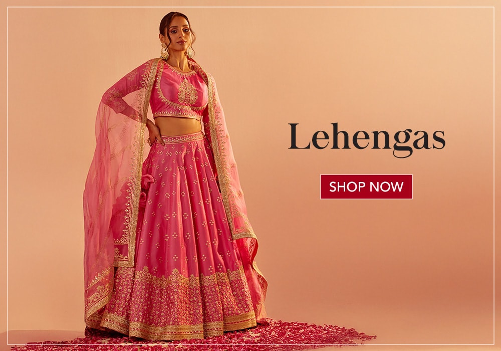 Model wearing a pink lehenga set