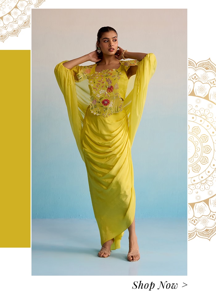 Model wearing a sunshine yellow draped skirt set