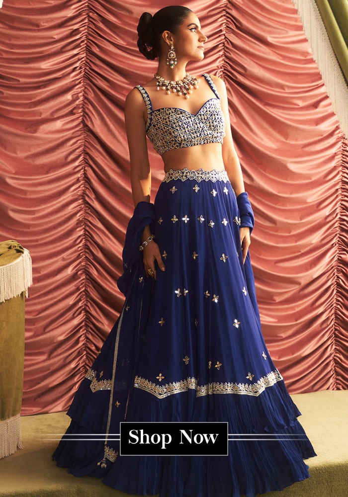 Model wearing a blue lehenga