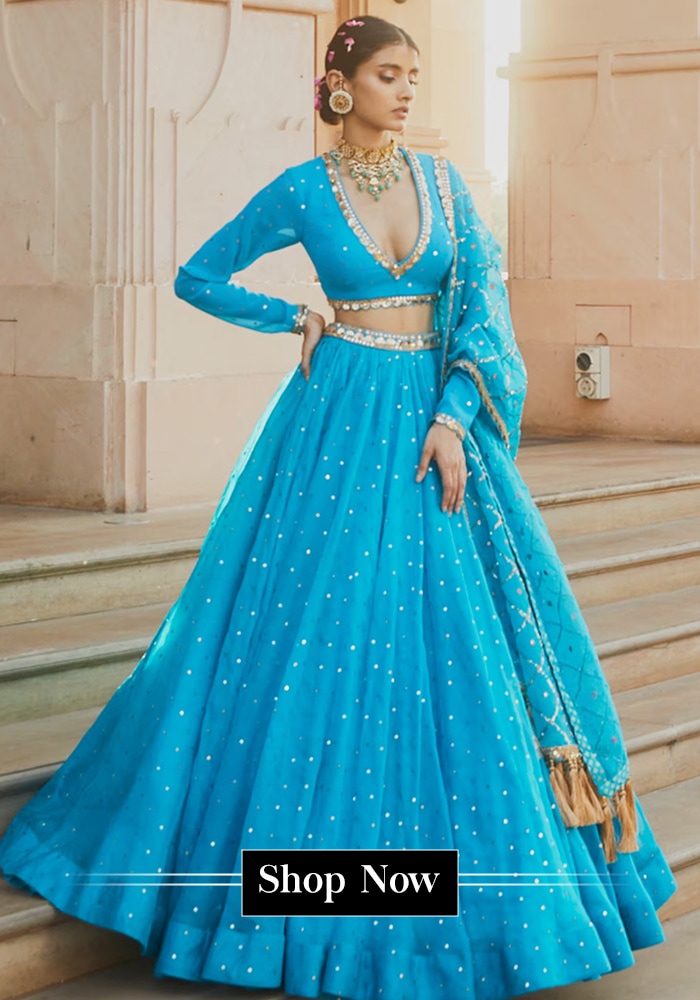 Model wearing a blue A-line lehenga