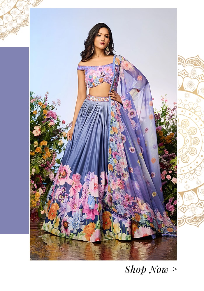 Model wearing blue embroidered off-the-shoulder lehenga