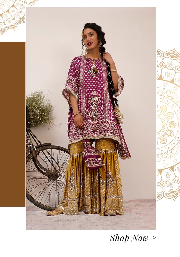 Model wearing purple kaftan and sharara set