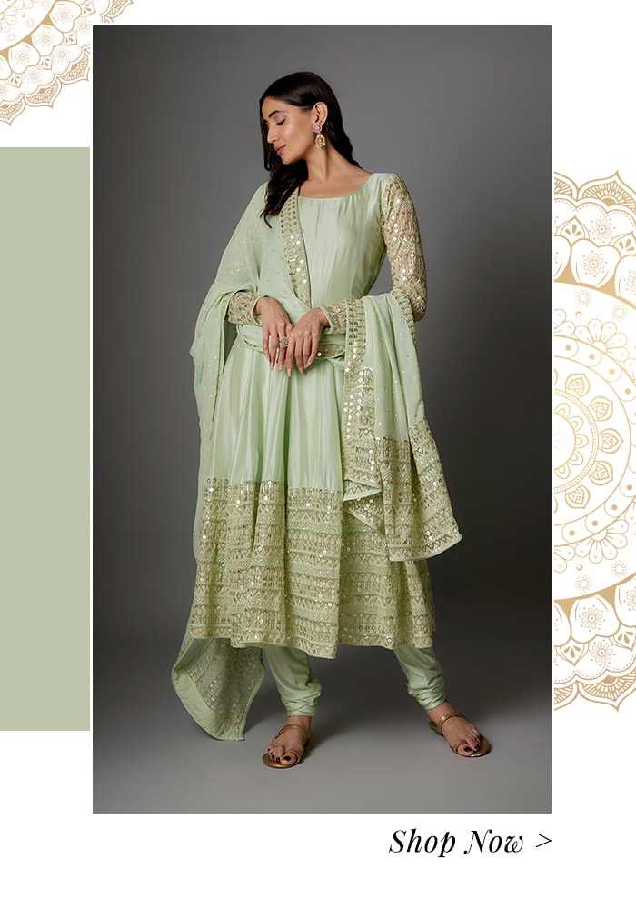 Model wearing a mint green anarkali