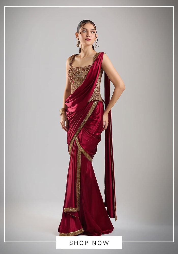 Red pre-draped Tarun Tahiliani saree