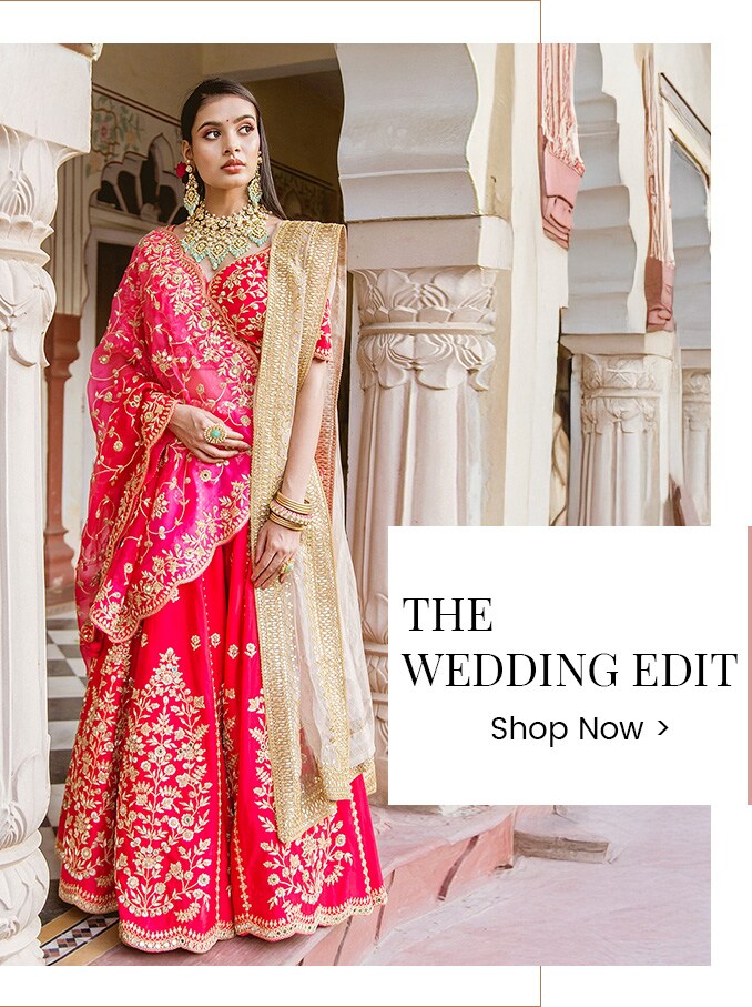 Mode wearing a red lehenga