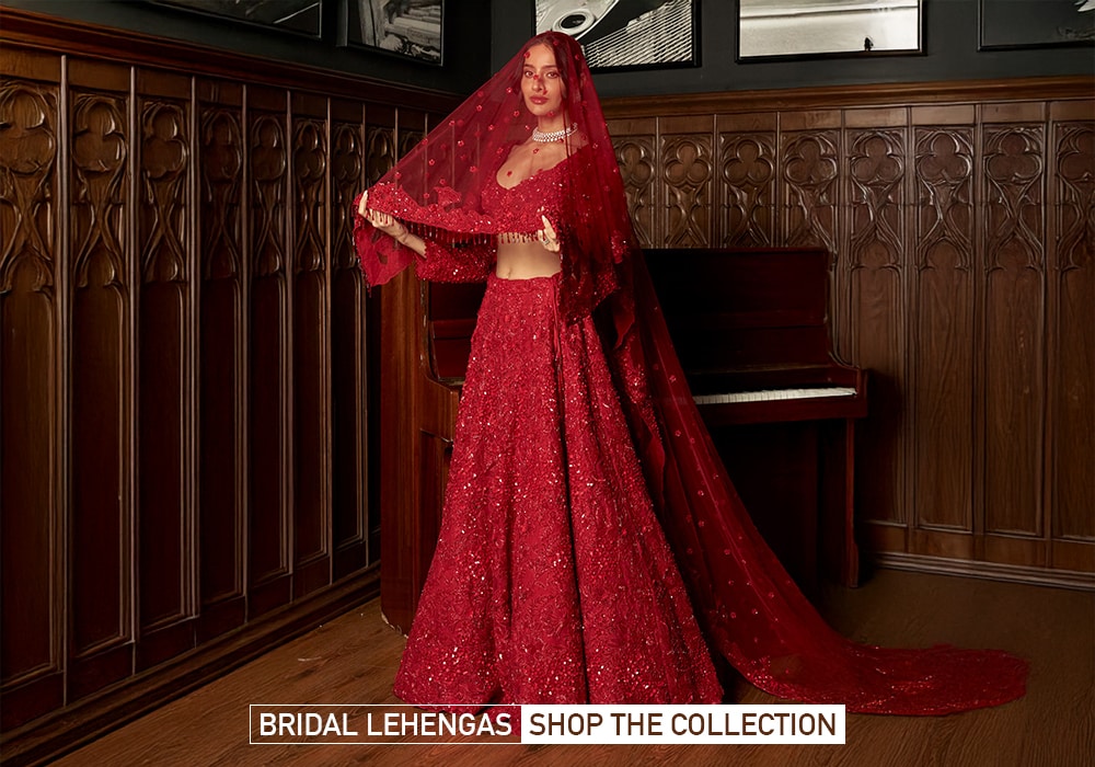 Model wearing a red lehenga