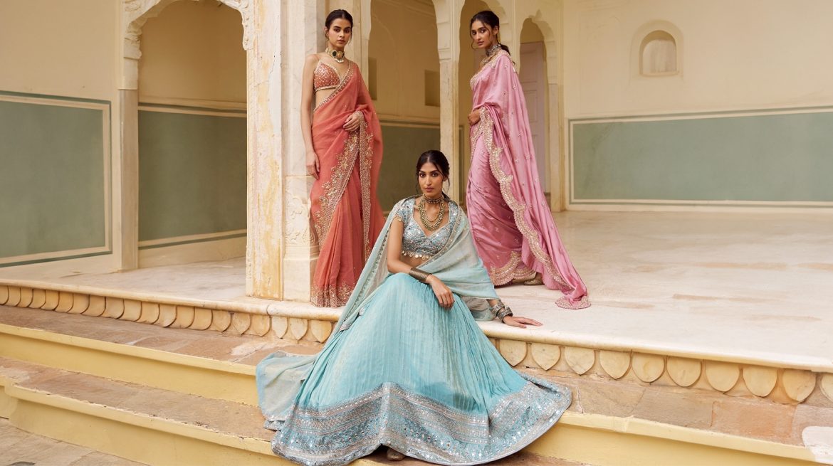 Models wearing lightweight Indian outfits