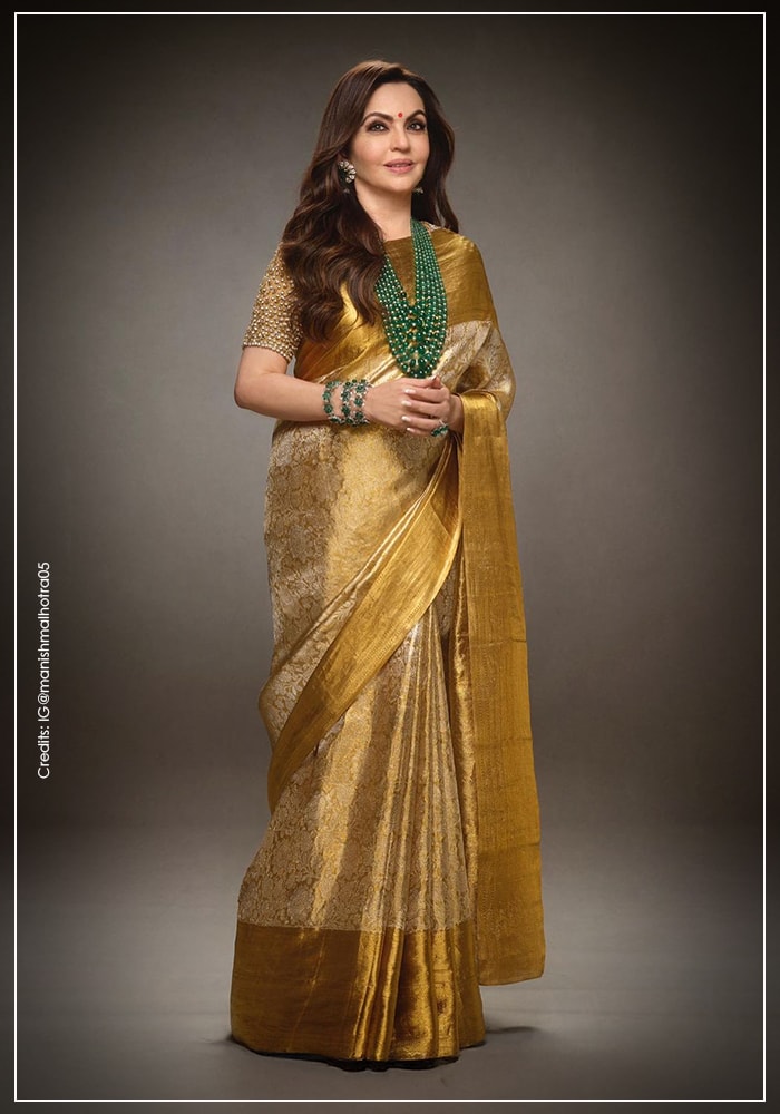 Nita Ambani wearing Manish Malhotra designed handloom saree