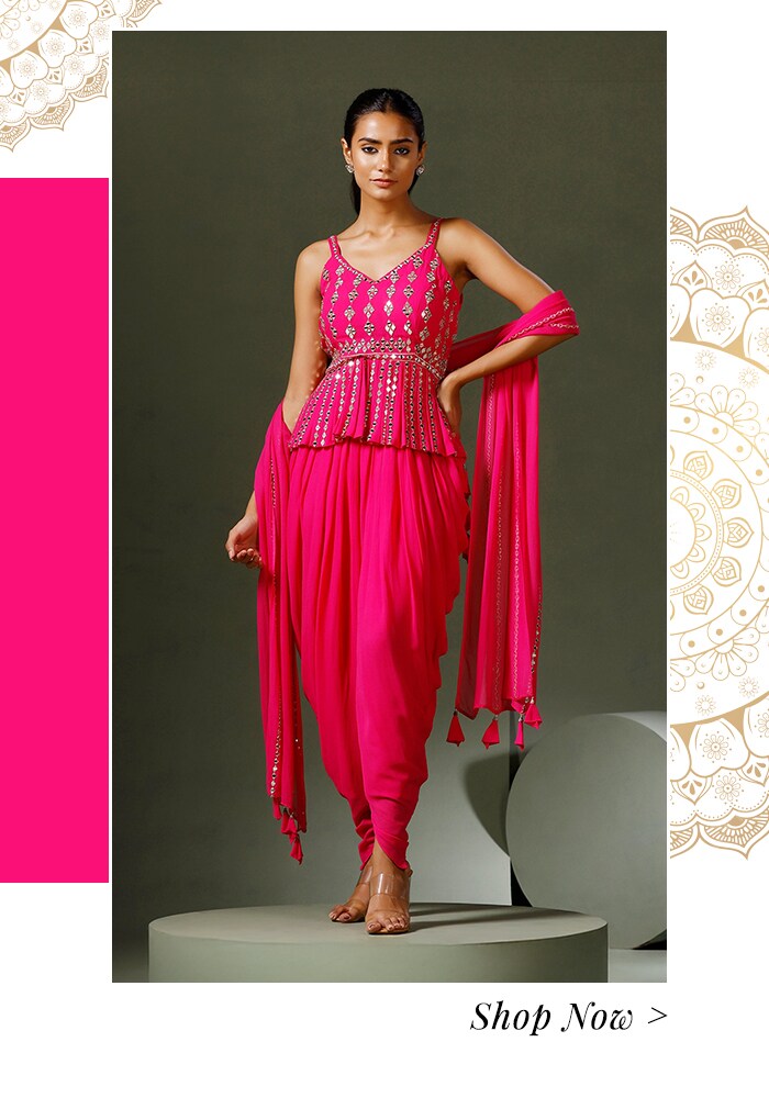 Model in fuchshia kurta and dhoti pant set