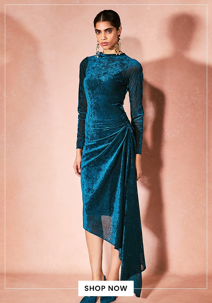 The Foundation: Statement Dresses and Jumpsuits 