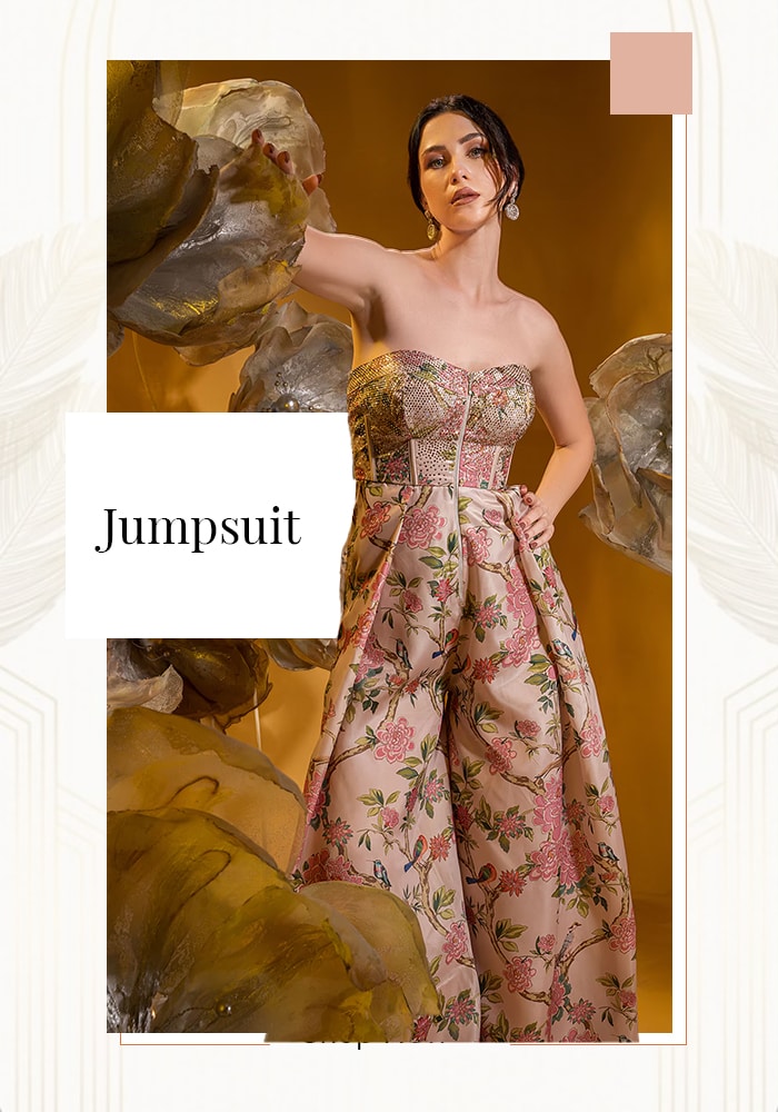 Model wearing off shoulder printed jumpsuit