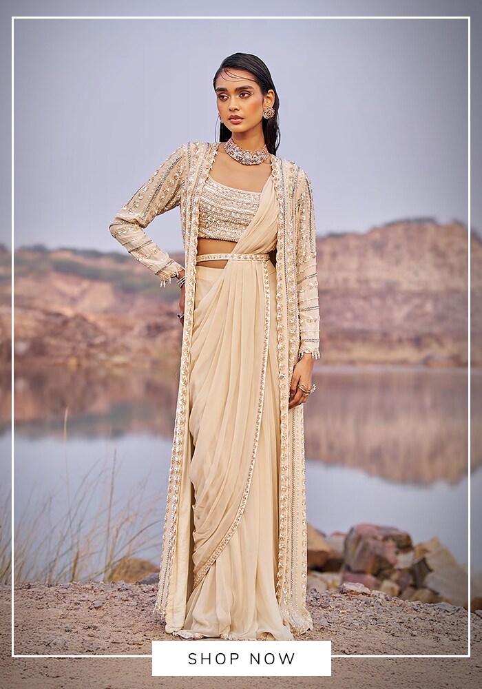 15 Showstopping Bridal Sarees Everyone Is Talking About Right Now 11 Gold cape sarees