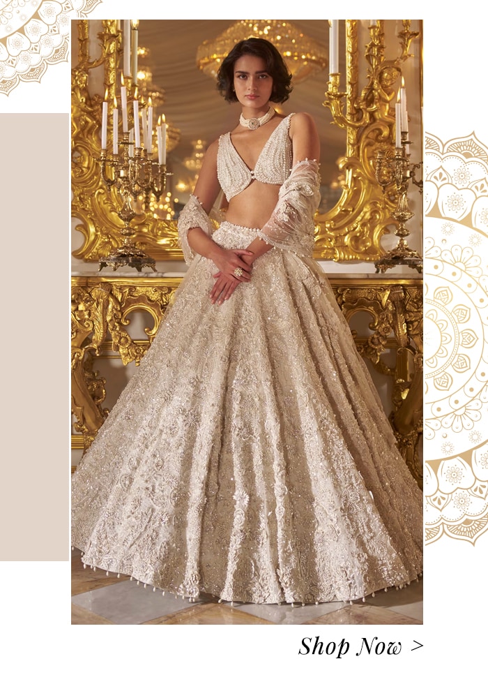 A Fairytale Indian Wedding at Oheka Castle: Bridal & Bridesmaid Fashion, Budget, and More 7 3D floral embroidered ivory lehenga