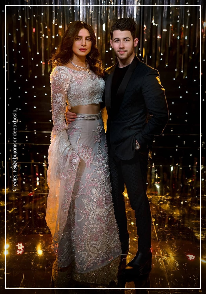 Priyanka Chopra Jonas’ White Anamika Khanna Lehenga Saree Serves Pure Goddess Energy 5 Priyanka Chopra and Nick Jonas at theri third wedding reception in Mumbai