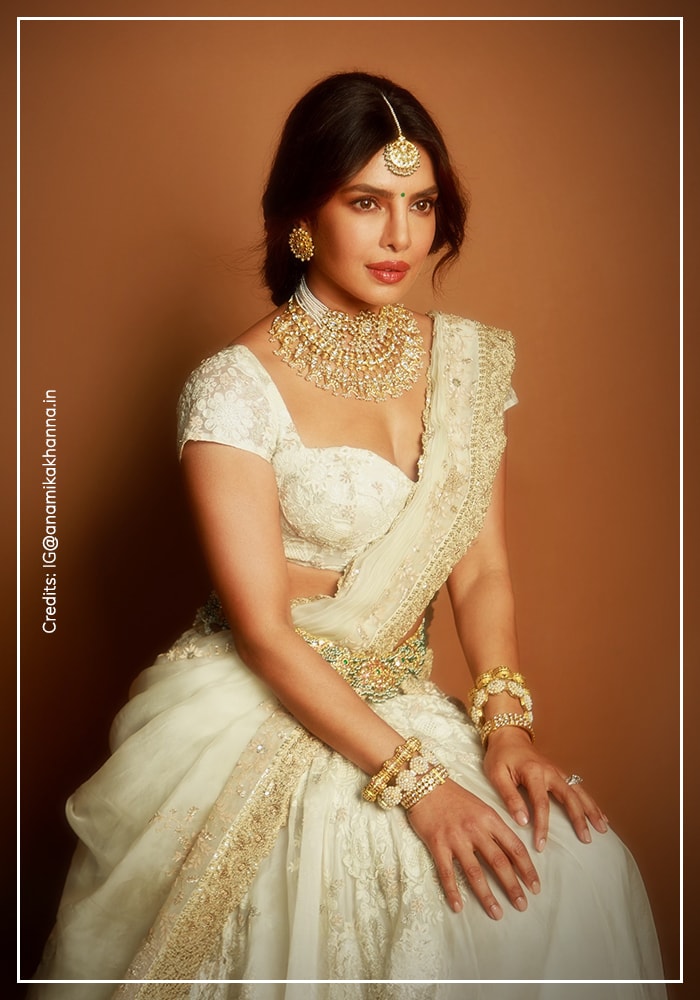 Priyanka Chopra Jonas’ White Anamika Khanna Lehenga Saree Serves Pure Goddess Energy 1 Priyanka Chopra in all-white lehenga saree