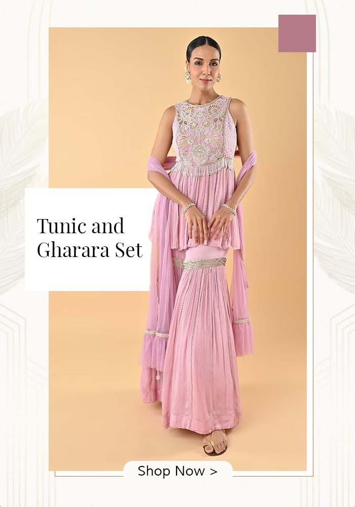 Model wearing purple tunic and gharara set