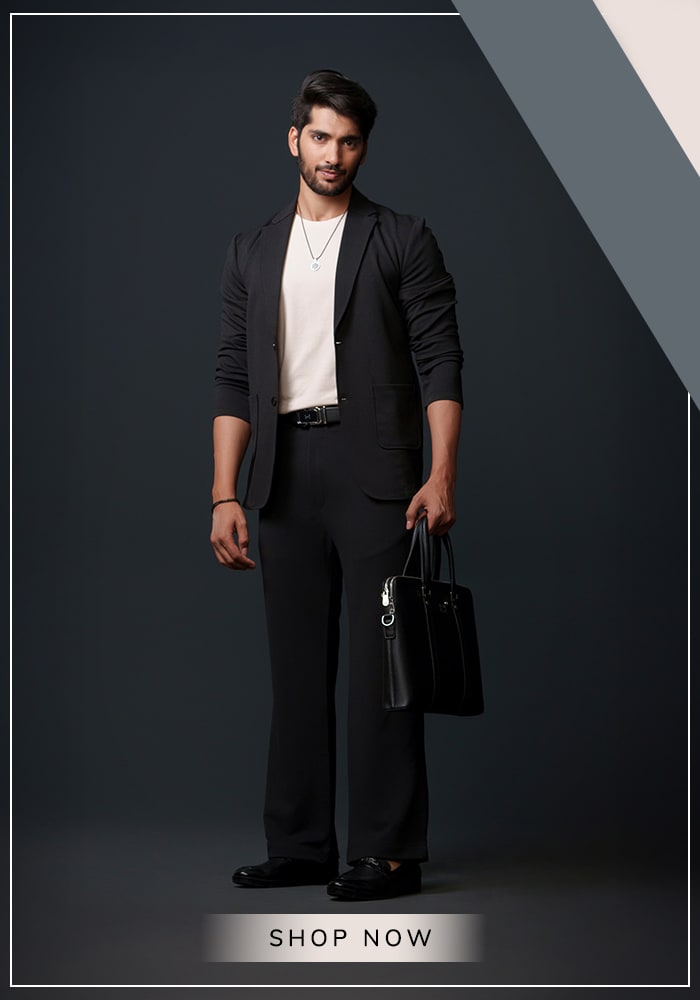 Men’s Day: How Modern Menswear Defines the New Age Gentleman 1 Model wearing black jacket and pant set