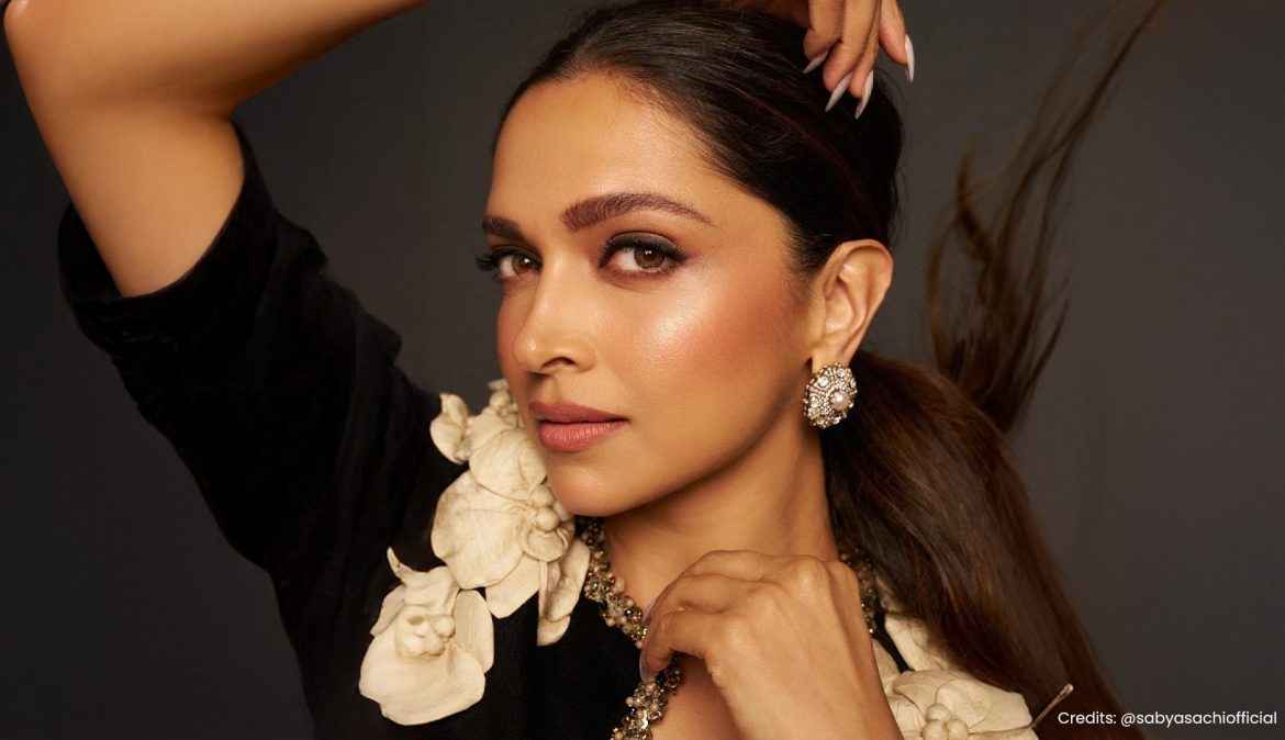 Deepika Padukone wearing black Sabyasachi dress and statement stud earrings