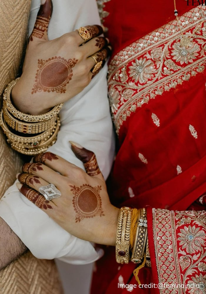 Gold kadas and minimal mehendi design on Samantha Ruth Prabhu