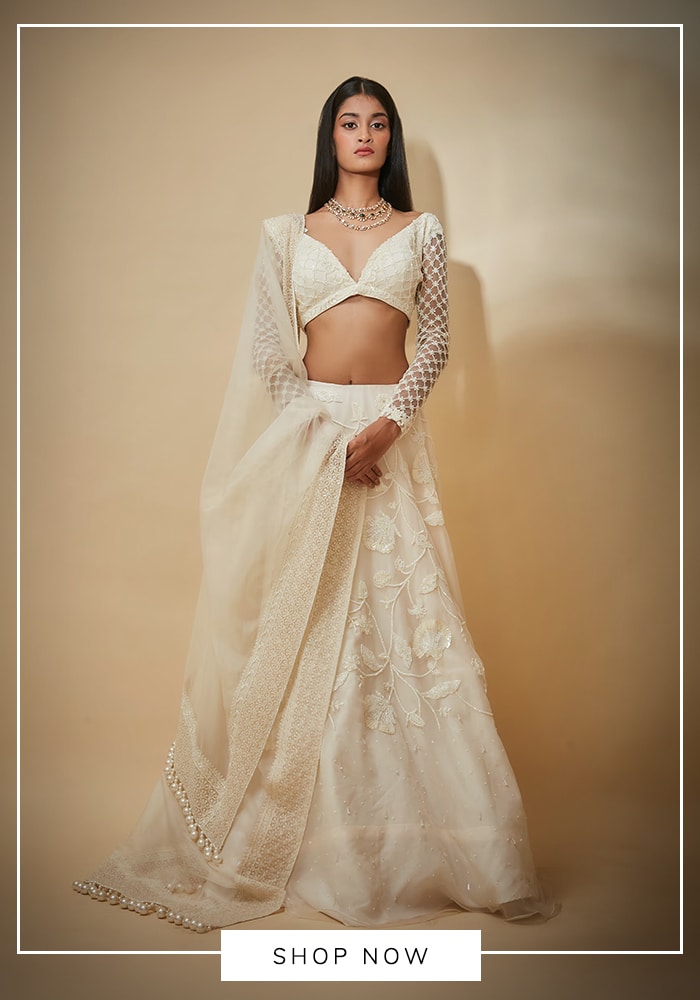White thread embroidered bridal lehenga