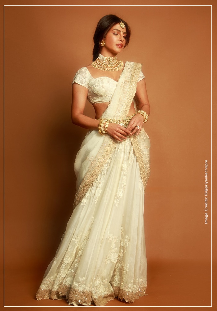 Priyanka Chopra in Anamika Khanna white lehenga saree