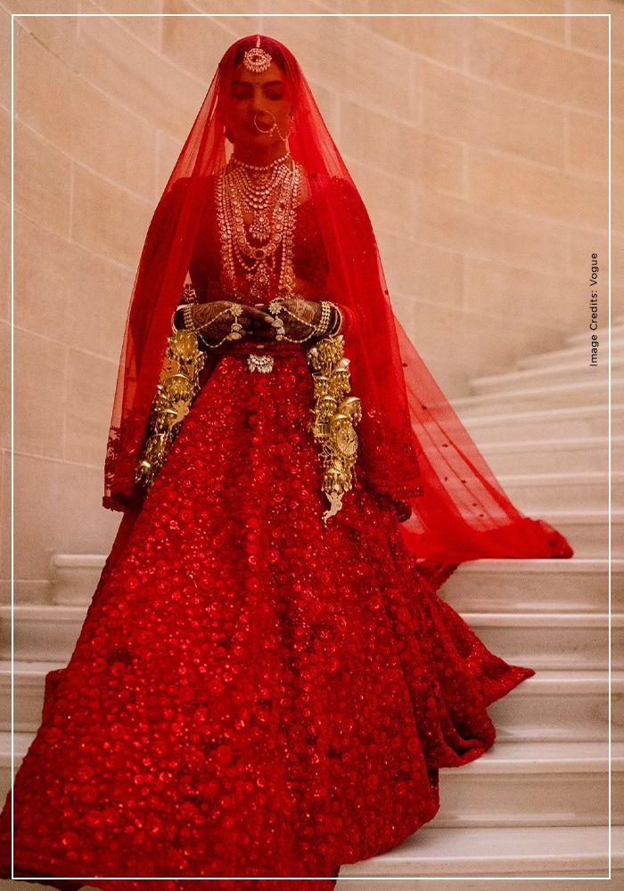 Priyank Chopra red bridal lehenga by Sabysasachi