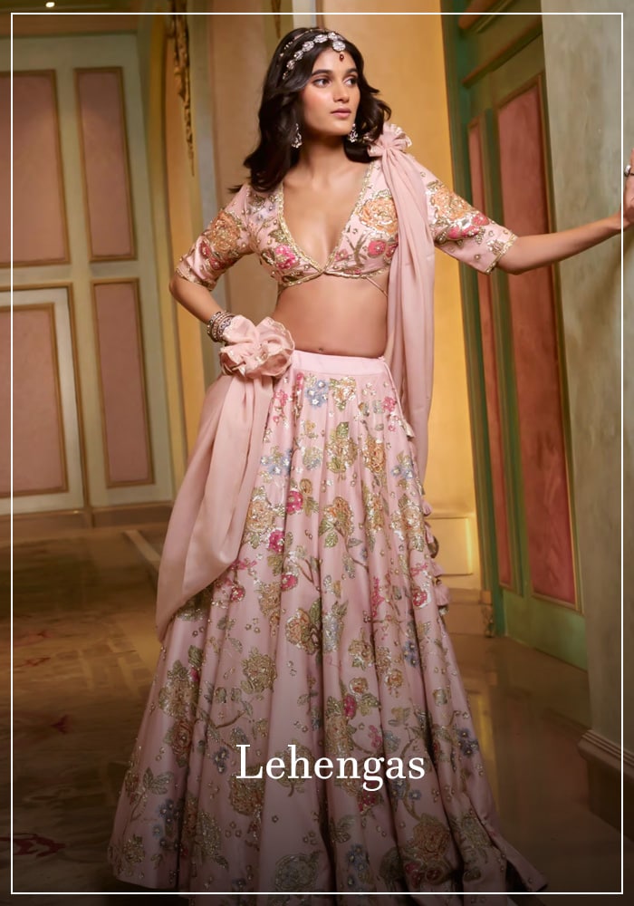 Printed pink Paulmi and Harsh lehengas