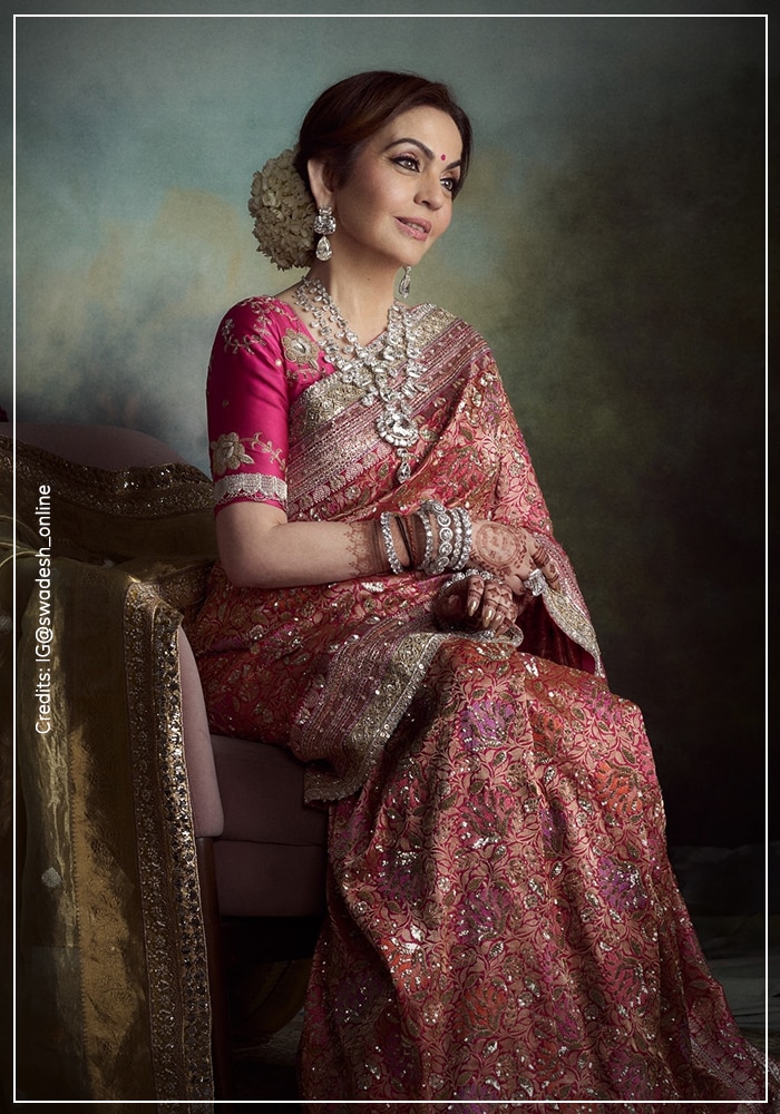 Nita Ambabi wearing pink banarasi saree