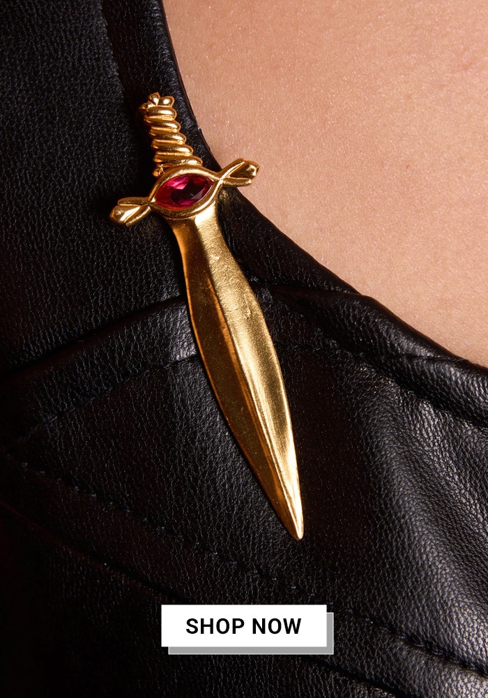 Gold dagger brooch