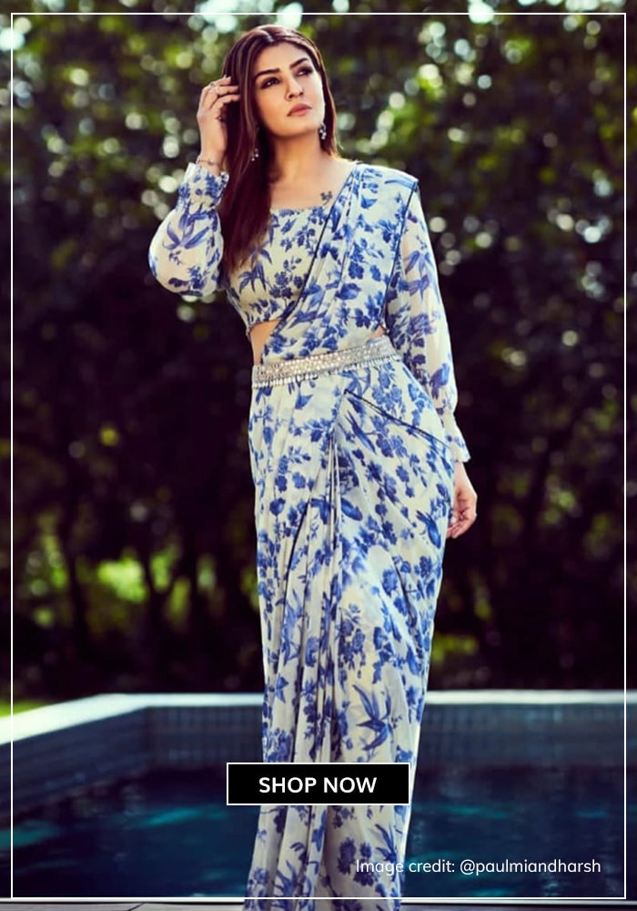 Raveena Tandon pre-draped white and blue saree