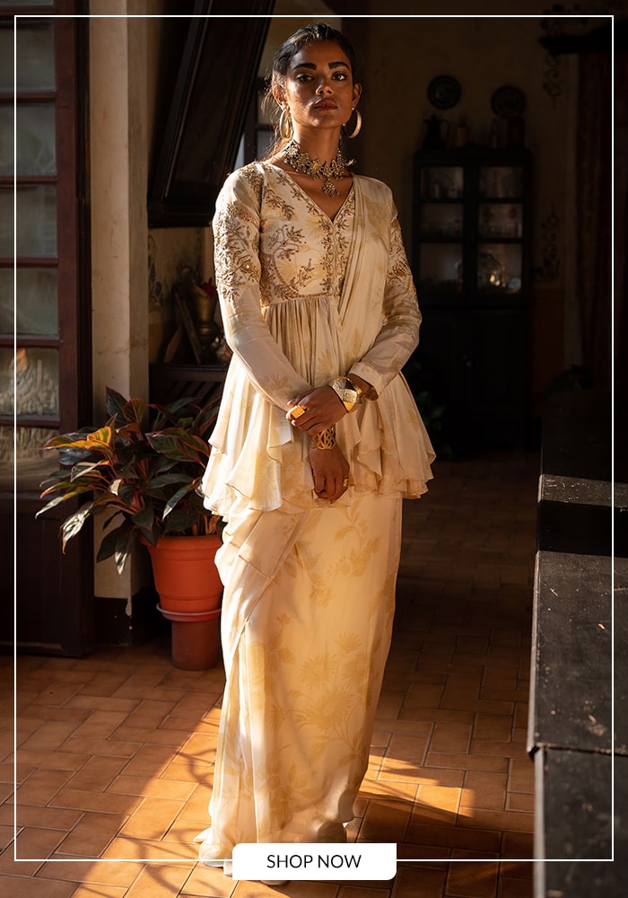 Paulmi and Harsh ivory pre-draped saree and peplum top
