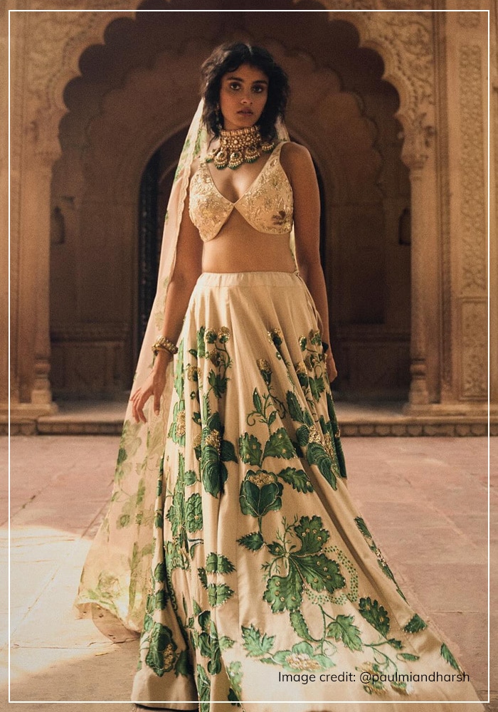 Paulmi and Harsh white and green lehenga