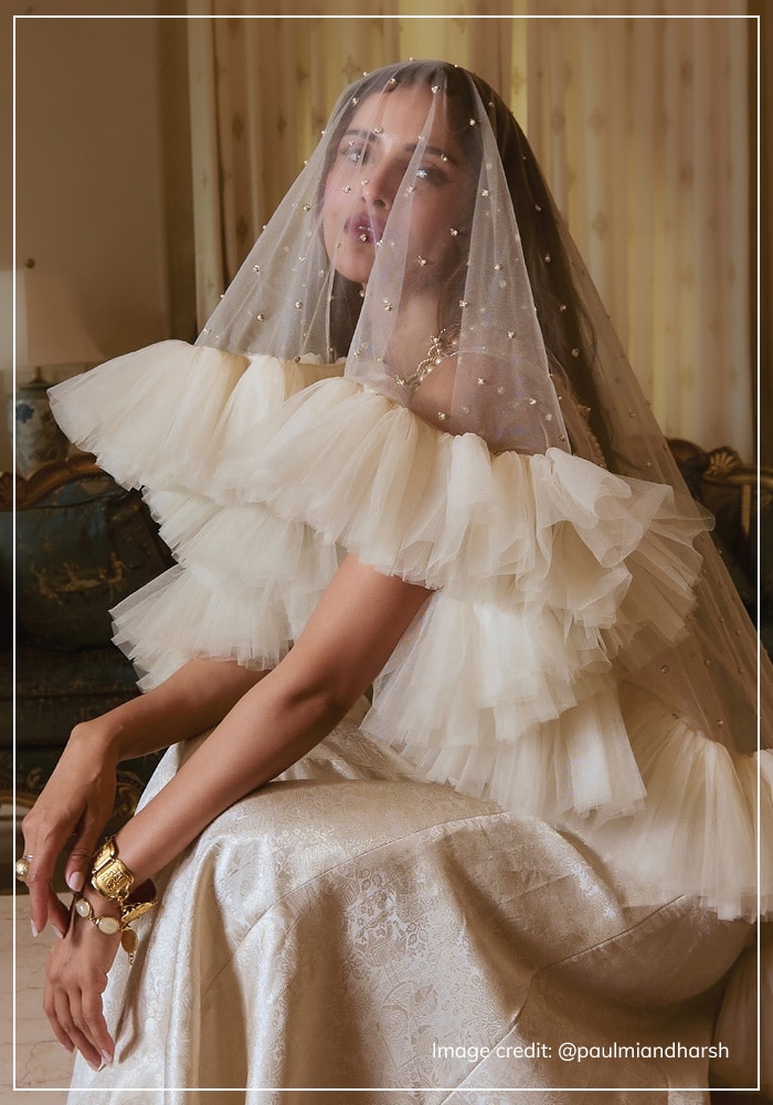 Paulmi and Harsh white bridal wear