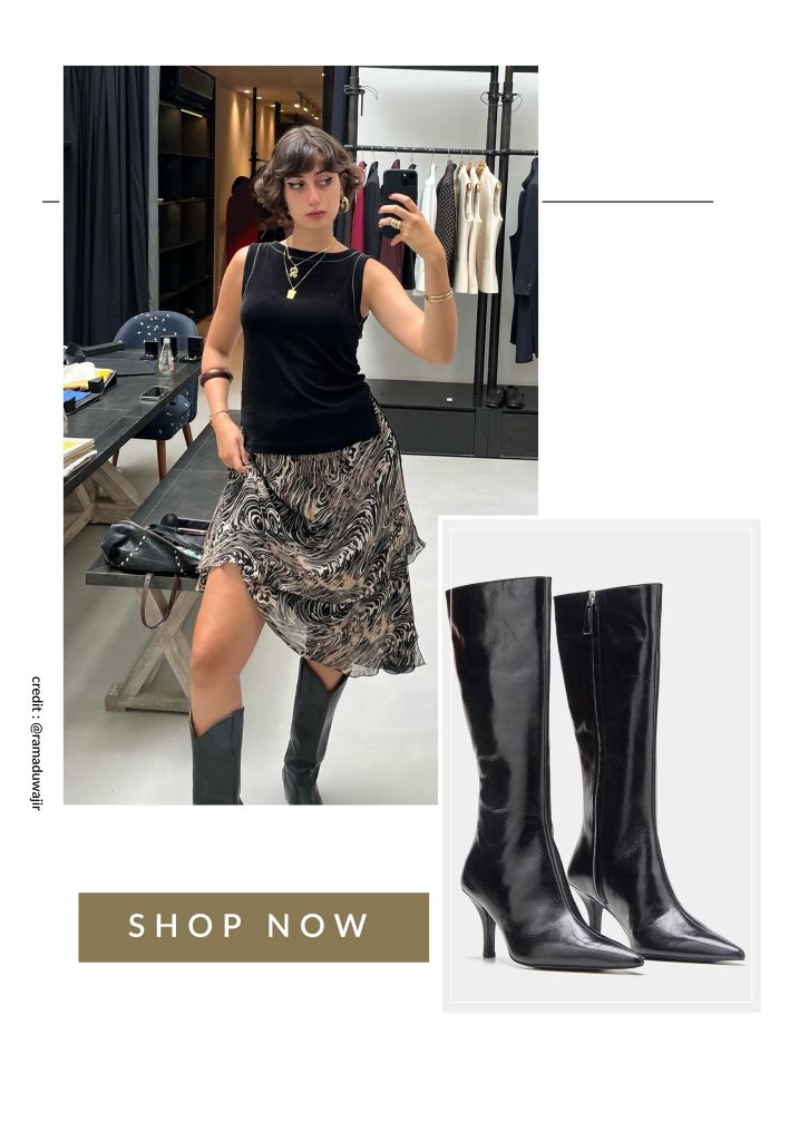 Rama Duwaji wearing knee length boots