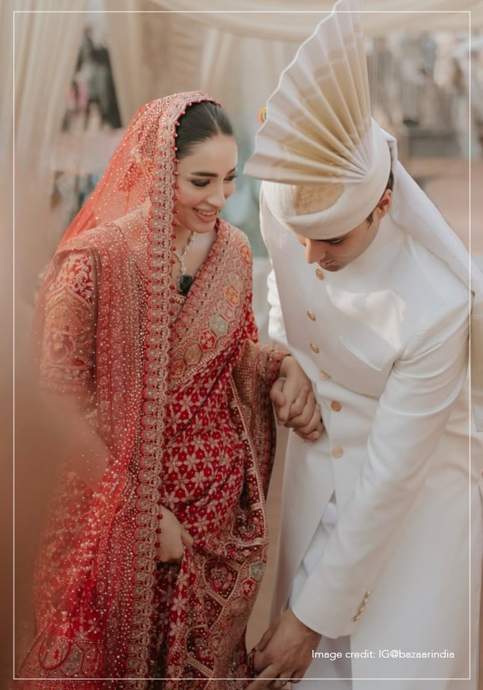 Shanzeh Ali wearing red Tarun Tahiliani saree