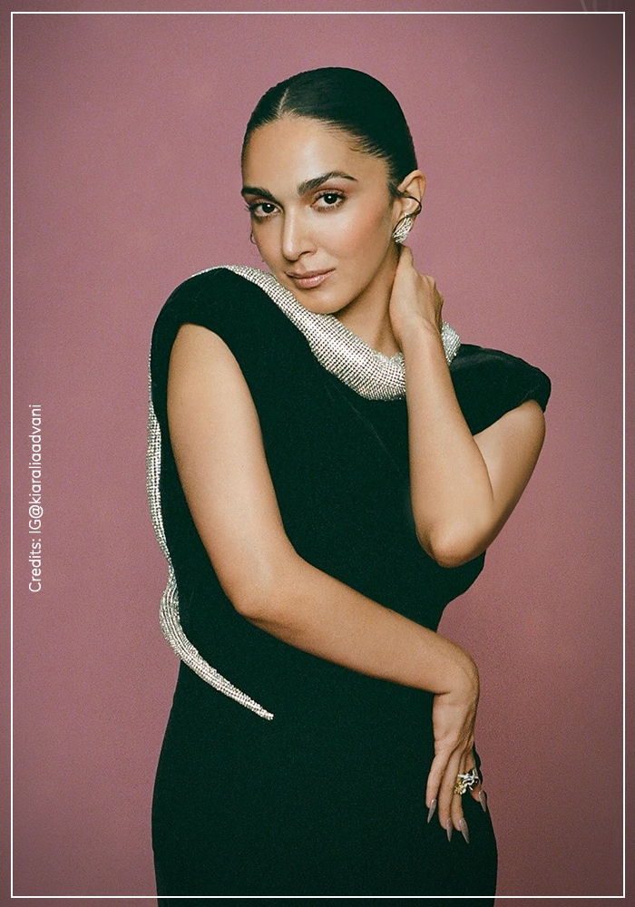 Kiara wearing silver serpentine necklace