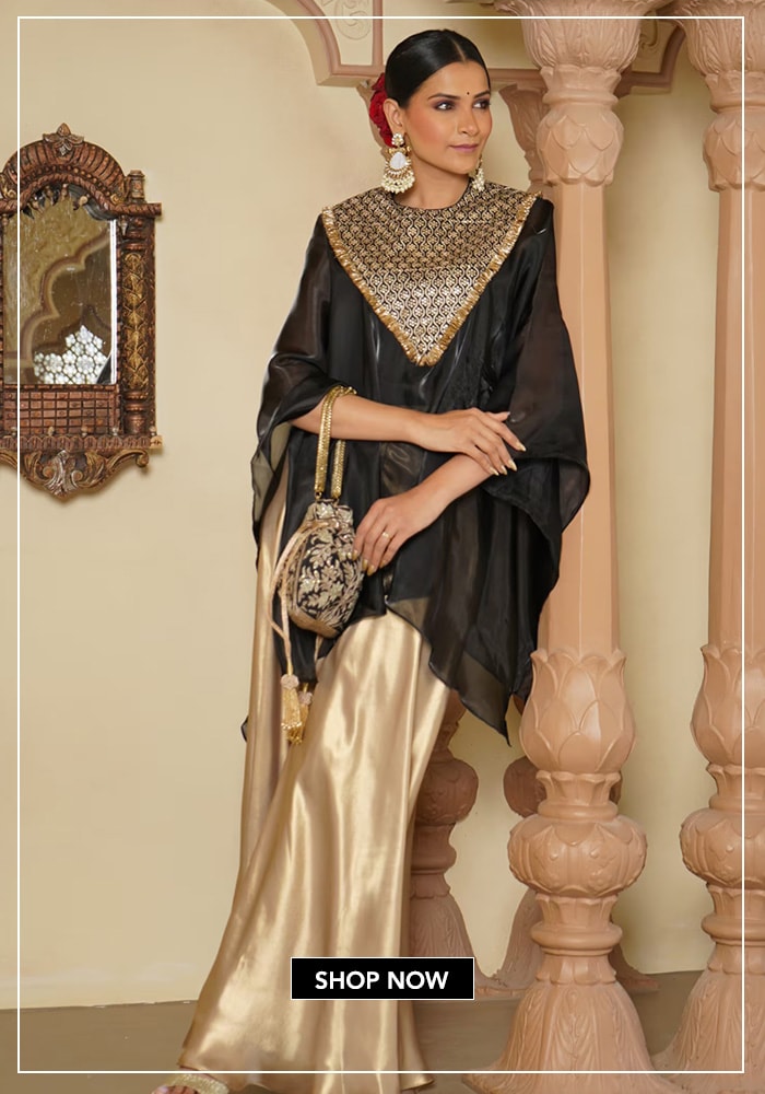 Black cape and golden skirt set