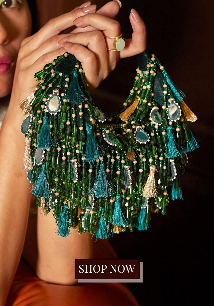 Green velvet handbag with mirror charms