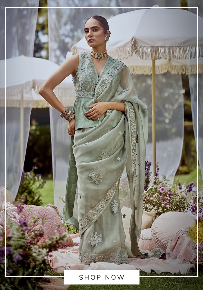 Jade green embroidered saree and peplum blouse