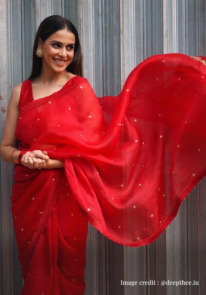 Mira Rajput wearing red organza saree