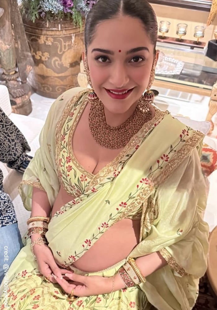 Sonam Kapoor in a ime green cape lehenga